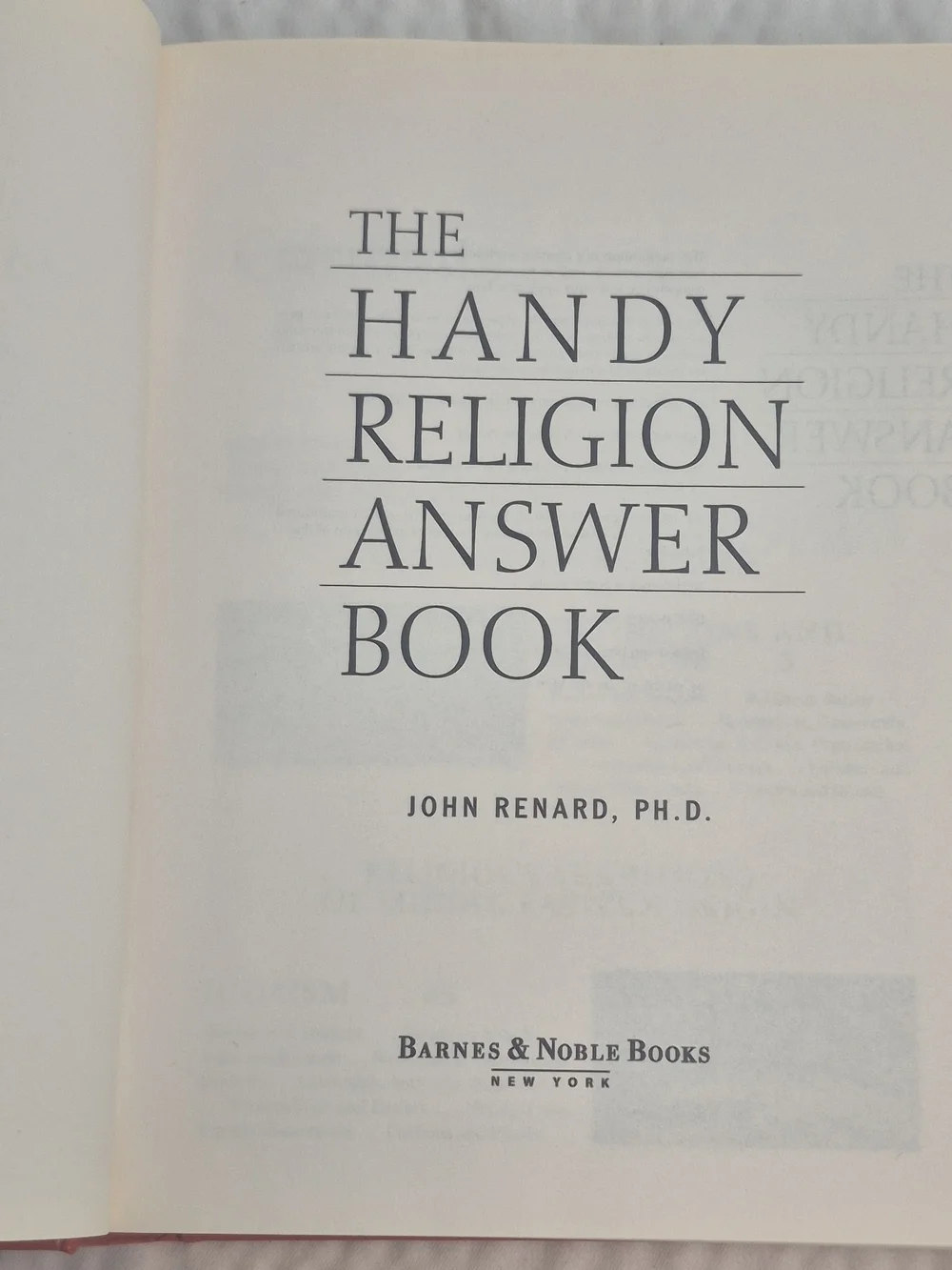 The Handy Religion Answer Book by John Renard - Orange Hardcover